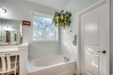 This beautifully landscaped home is a nature lovers paradise on Wachesaw Plantation East Golf Course in South Carolina - for sale on GolfHomes.com, golf home, golf lot