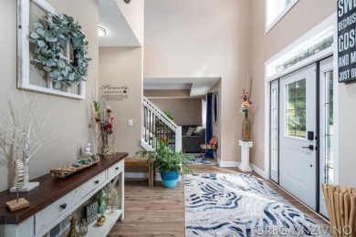 Welcome to 309 Woodview, a beautifully reimagined 4-bedroom on Eagle Island Golf Club in Michigan - for sale on GolfHomes.com, golf home, golf lot