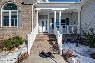 Welcome to 2022 Caracara Drive, where refined finishes meet on Harbour Point Golf Club in North Carolina - for sale on GolfHomes.com, golf home, golf lot