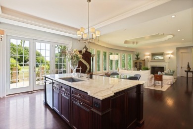 Luxurious 7-Bedroom Home on the 9th Hole of Apple Mountain Golf on Golf Club At Apple Mountain in Michigan - for sale on GolfHomes.com, golf home, golf lot
