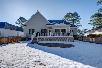 Welcome to 2022 Caracara Drive, where refined finishes meet on Harbour Point Golf Club in North Carolina - for sale on GolfHomes.com, golf home, golf lot