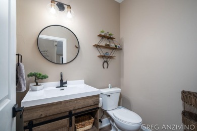 Welcome to 309 Woodview, a beautifully reimagined 4-bedroom on Eagle Island Golf Club in Michigan - for sale on GolfHomes.com, golf home, golf lot