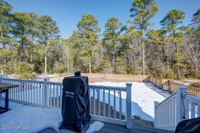 Welcome to 2022 Caracara Drive, where refined finishes meet on Harbour Point Golf Club in North Carolina - for sale on GolfHomes.com, golf home, golf lot
