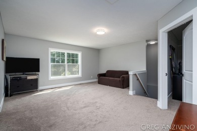 Welcome to 309 Woodview, a beautifully reimagined 4-bedroom on Eagle Island Golf Club in Michigan - for sale on GolfHomes.com, golf home, golf lot