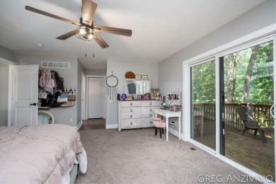 Welcome to 309 Woodview, a beautifully reimagined 4-bedroom on Eagle Island Golf Club in Michigan - for sale on GolfHomes.com, golf home, golf lot
