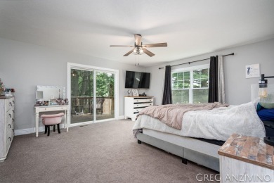 Welcome to 309 Woodview, a beautifully reimagined 4-bedroom on Eagle Island Golf Club in Michigan - for sale on GolfHomes.com, golf home, golf lot
