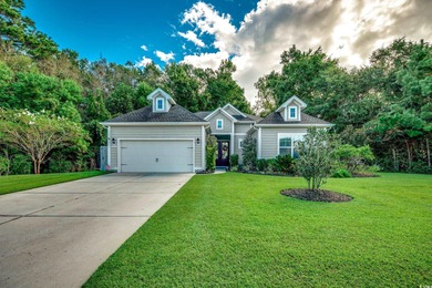 This beautifully landscaped home is a nature lovers paradise on Wachesaw Plantation East Golf Course in South Carolina - for sale on GolfHomes.com, golf home, golf lot