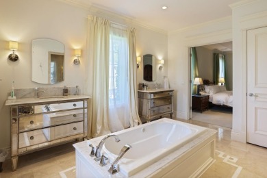 Luxurious 7-Bedroom Home on the 9th Hole of Apple Mountain Golf on Golf Club At Apple Mountain in Michigan - for sale on GolfHomes.com, golf home, golf lot