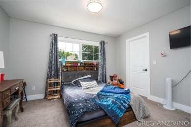Welcome to 309 Woodview, a beautifully reimagined 4-bedroom on Eagle Island Golf Club in Michigan - for sale on GolfHomes.com, golf home, golf lot