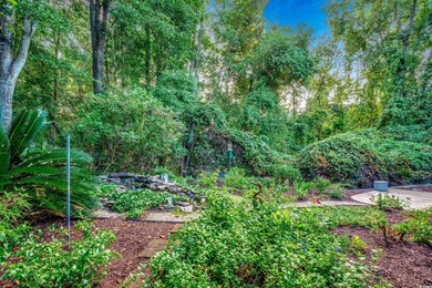 This beautifully landscaped home is a nature lovers paradise on Wachesaw Plantation East Golf Course in South Carolina - for sale on GolfHomes.com, golf home, golf lot