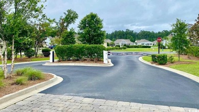 This beautifully landscaped home is a nature lovers paradise on Wachesaw Plantation East Golf Course in South Carolina - for sale on GolfHomes.com, golf home, golf lot