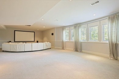 Luxurious 7-Bedroom Home on the 9th Hole of Apple Mountain Golf on Golf Club At Apple Mountain in Michigan - for sale on GolfHomes.com, golf home, golf lot