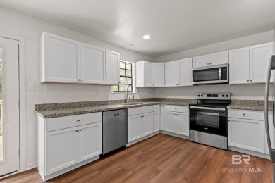 Enjoy living in convenient Lake Forest in this updated one-story on Lake Forest Yacht and Country Club in Alabama - for sale on GolfHomes.com, golf home, golf lot