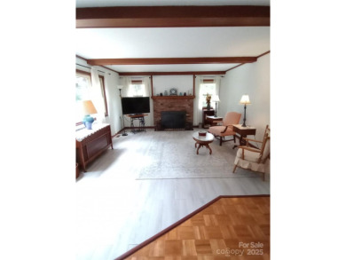 Charming and unique home nestled in Country Club Estates on Hendersonville Country Club in North Carolina - for sale on GolfHomes.com, golf home, golf lot