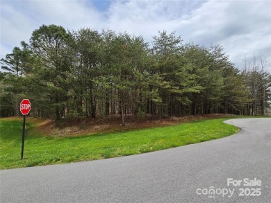 This Badin Lake waterfront lot is located in the prestigious on Old North State Club at Uwharrie Point Golf community in North Carolina - for sale on GolfHomes.com, golf home, golf lot