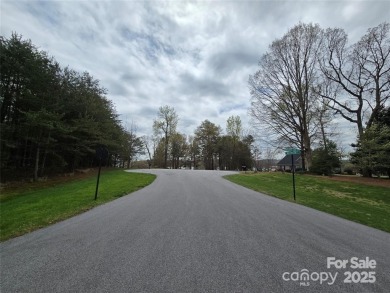 This Badin Lake waterfront lot is located in the prestigious on Old North State Club at Uwharrie Point Golf community in North Carolina - for sale on GolfHomes.com, golf home, golf lot