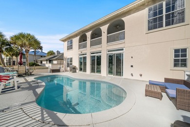 Tucked behind the private gates of the Bay Point community, this on Bay Point Resort Golf Club in Florida - for sale on GolfHomes.com, golf home, golf lot