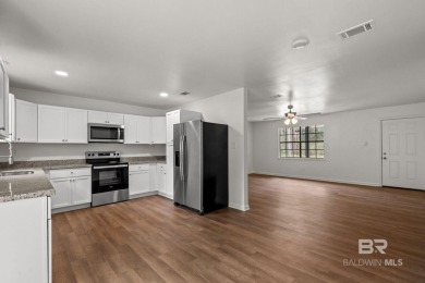 Enjoy living in convenient Lake Forest in this updated one-story on Lake Forest Yacht and Country Club in Alabama - for sale on GolfHomes.com, golf home, golf lot
