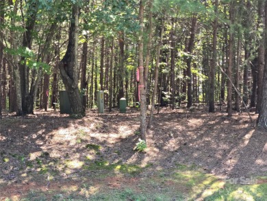 This Badin Lake waterfront lot is located in the prestigious on Old North State Club at Uwharrie Point Golf community in North Carolina - for sale on GolfHomes.com, golf home, golf lot