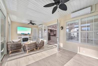 Tucked behind the private gates of the Bay Point community, this on Bay Point Resort Golf Club in Florida - for sale on GolfHomes.com, golf home, golf lot