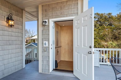 CUSTOM BUILT OCEAN VIEW RAISED BEACH HOUSE WITH HUGE WRAPAROUND on Prestwick Country Club in South Carolina - for sale on GolfHomes.com, golf home, golf lot