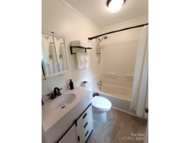 Charming and unique home nestled in Country Club Estates on Hendersonville Country Club in North Carolina - for sale on GolfHomes.com, golf home, golf lot
