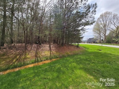 This Badin Lake waterfront lot is located in the prestigious on Old North State Club at Uwharrie Point Golf community in North Carolina - for sale on GolfHomes.com, golf home, golf lot