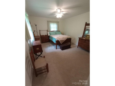 Charming and unique home nestled in Country Club Estates on Hendersonville Country Club in North Carolina - for sale on GolfHomes.com, golf home, golf lot