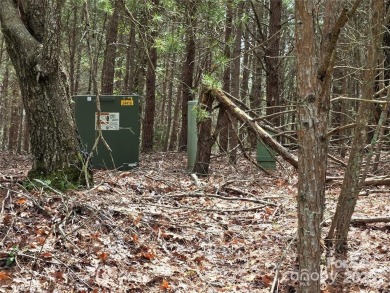 This Badin Lake waterfront lot is located in the prestigious on Old North State Club at Uwharrie Point Golf community in North Carolina - for sale on GolfHomes.com, golf home, golf lot