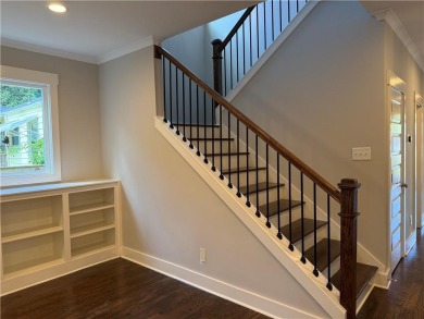 Welcome to this stunning 4-bedroom, 4-bathroom home located in on East Lake Golf Club in Georgia - for sale on GolfHomes.com, golf home, golf lot