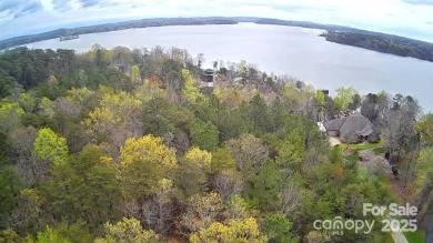 This Badin Lake waterfront lot is located in the prestigious on Old North State Club at Uwharrie Point Golf community in North Carolina - for sale on GolfHomes.com, golf home, golf lot