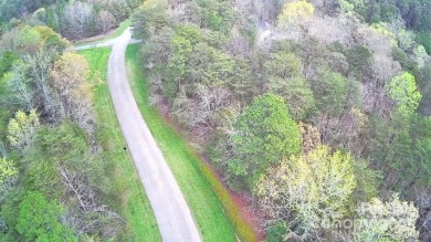 This Badin Lake waterfront lot is located in the prestigious on Old North State Club at Uwharrie Point Golf community in North Carolina - for sale on GolfHomes.com, golf home, golf lot