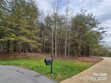 This Badin Lake waterfront lot is located in the prestigious on Old North State Club at Uwharrie Point Golf community in North Carolina - for sale on GolfHomes.com, golf home, golf lot