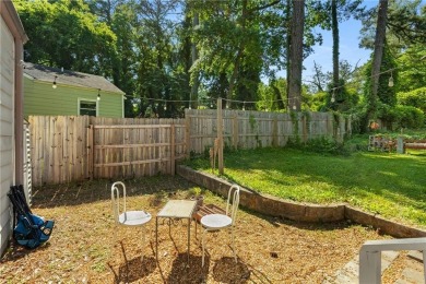 This adorable bungalow overlooks the Charlie Yates golf course on Charlie Yates Golf Course in Georgia - for sale on GolfHomes.com, golf home, golf lot