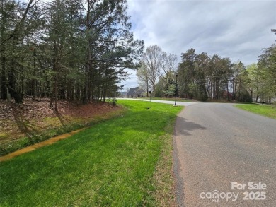 This Badin Lake waterfront lot is located in the prestigious on Old North State Club at Uwharrie Point Golf community in North Carolina - for sale on GolfHomes.com, golf home, golf lot