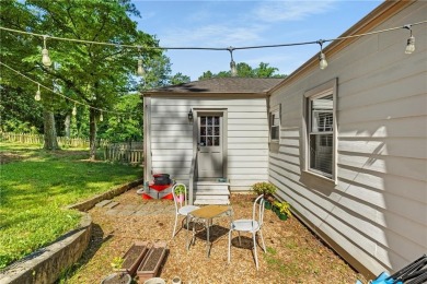 This adorable bungalow overlooks the Charlie Yates golf course on Charlie Yates Golf Course in Georgia - for sale on GolfHomes.com, golf home, golf lot