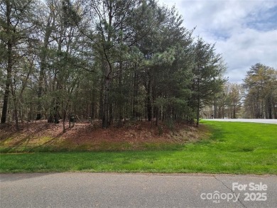 This Badin Lake waterfront lot is located in the prestigious on Old North State Club at Uwharrie Point Golf community in North Carolina - for sale on GolfHomes.com, golf home, golf lot