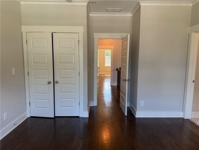 Welcome to this stunning 4-bedroom, 4-bathroom home located in on East Lake Golf Club in Georgia - for sale on GolfHomes.com, golf home, golf lot