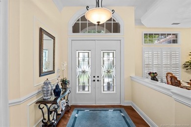 A true golfer's paradise, perfectly positioned on the 5th hole on PGA Golf Club in PGA Village in Florida - for sale on GolfHomes.com, golf home, golf lot