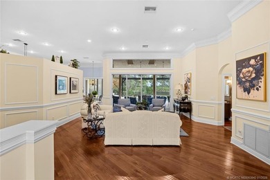 A true golfer's paradise, perfectly positioned on the 5th hole on PGA Golf Club in PGA Village in Florida - for sale on GolfHomes.com, golf home, golf lot