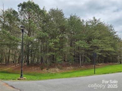 This Badin Lake waterfront lot is located in the prestigious on Old North State Club at Uwharrie Point Golf community in North Carolina - for sale on GolfHomes.com, golf home, golf lot