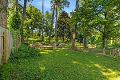 This adorable bungalow overlooks the Charlie Yates golf course on Charlie Yates Golf Course in Georgia - for sale on GolfHomes.com, golf home, golf lot