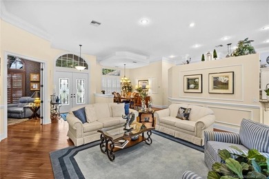 A true golfer's paradise, perfectly positioned on the 5th hole on PGA Golf Club in PGA Village in Florida - for sale on GolfHomes.com, golf home, golf lot