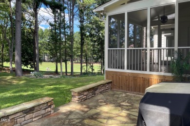 Relax in the sun-filled living spaces with hardwood floors on Heritage Golf Club in North Carolina - for sale on GolfHomes.com, golf home, golf lot