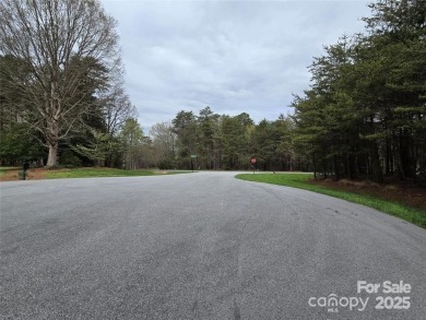 This Badin Lake waterfront lot is located in the prestigious on Old North State Club at Uwharrie Point Golf community in North Carolina - for sale on GolfHomes.com, golf home, golf lot