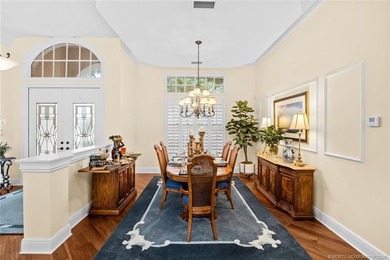 A true golfer's paradise, perfectly positioned on the 5th hole on PGA Golf Club in PGA Village in Florida - for sale on GolfHomes.com, golf home, golf lot