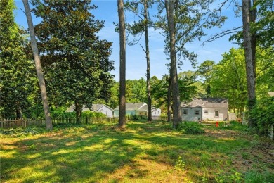 This adorable bungalow overlooks the Charlie Yates golf course on Charlie Yates Golf Course in Georgia - for sale on GolfHomes.com, golf home, golf lot