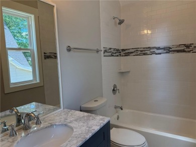 Welcome to this stunning 4-bedroom, 4-bathroom home located in on East Lake Golf Club in Georgia - for sale on GolfHomes.com, golf home, golf lot