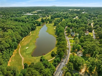 This adorable bungalow overlooks the Charlie Yates golf course on Charlie Yates Golf Course in Georgia - for sale on GolfHomes.com, golf home, golf lot