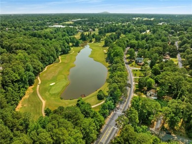 This adorable bungalow overlooks the Charlie Yates golf course on Charlie Yates Golf Course in Georgia - for sale on GolfHomes.com, golf home, golf lot